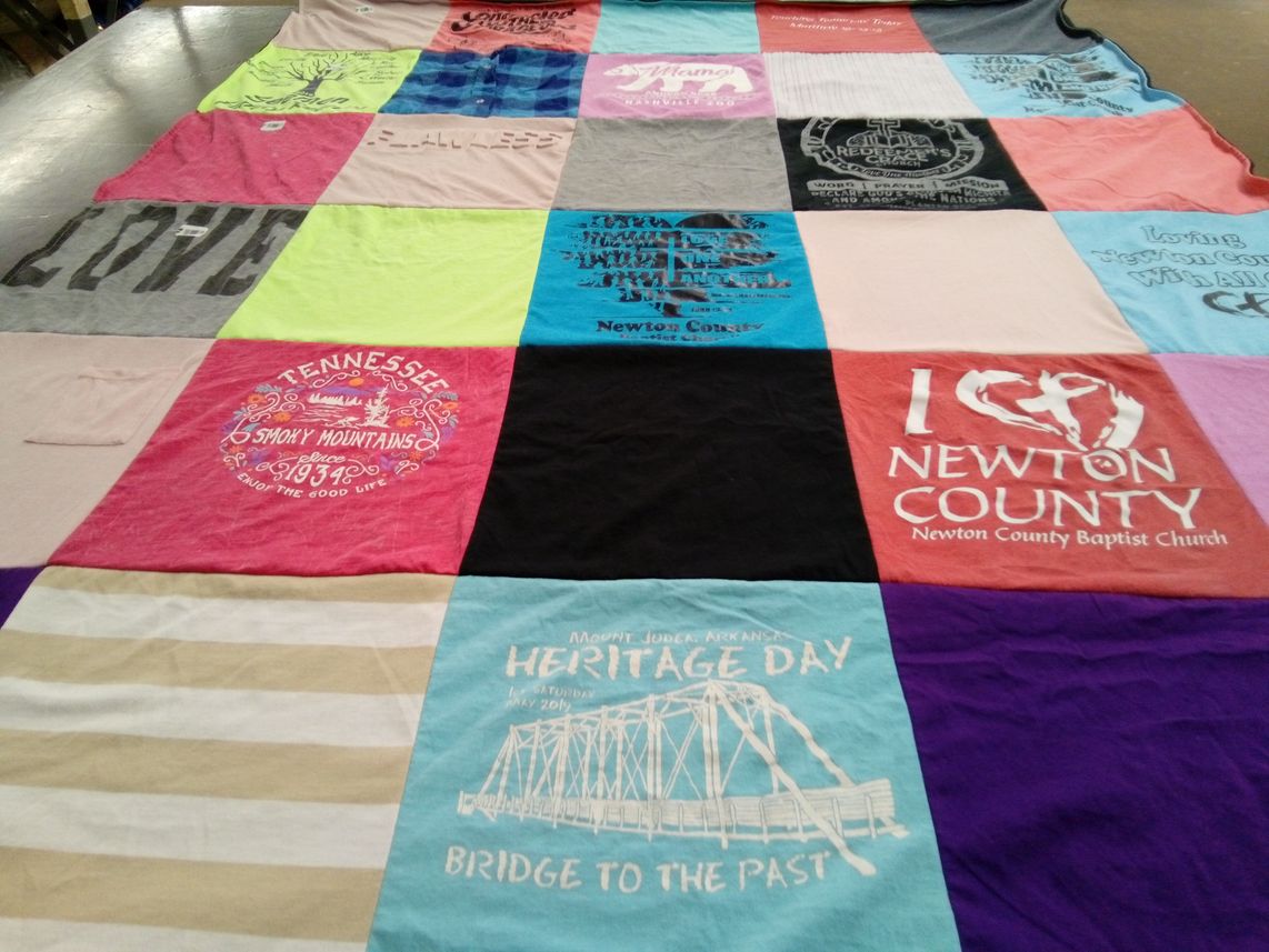 T-shirt quilt with travel, community themes by Brooke from IA