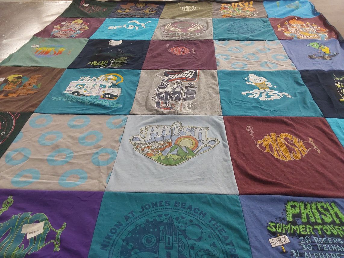 T-shirt quilt with music, concerts themes by Emily from NY
