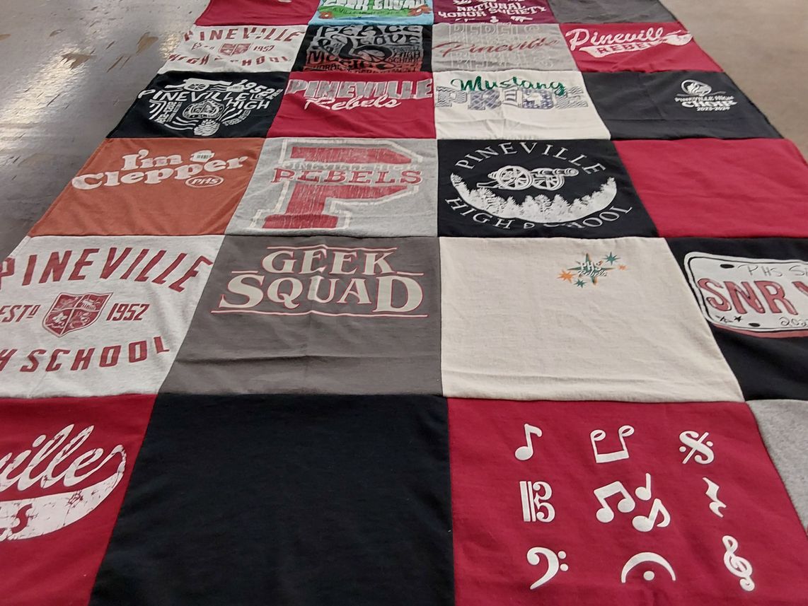 T-shirt quilt featuring pineville rebels by Emily from LA