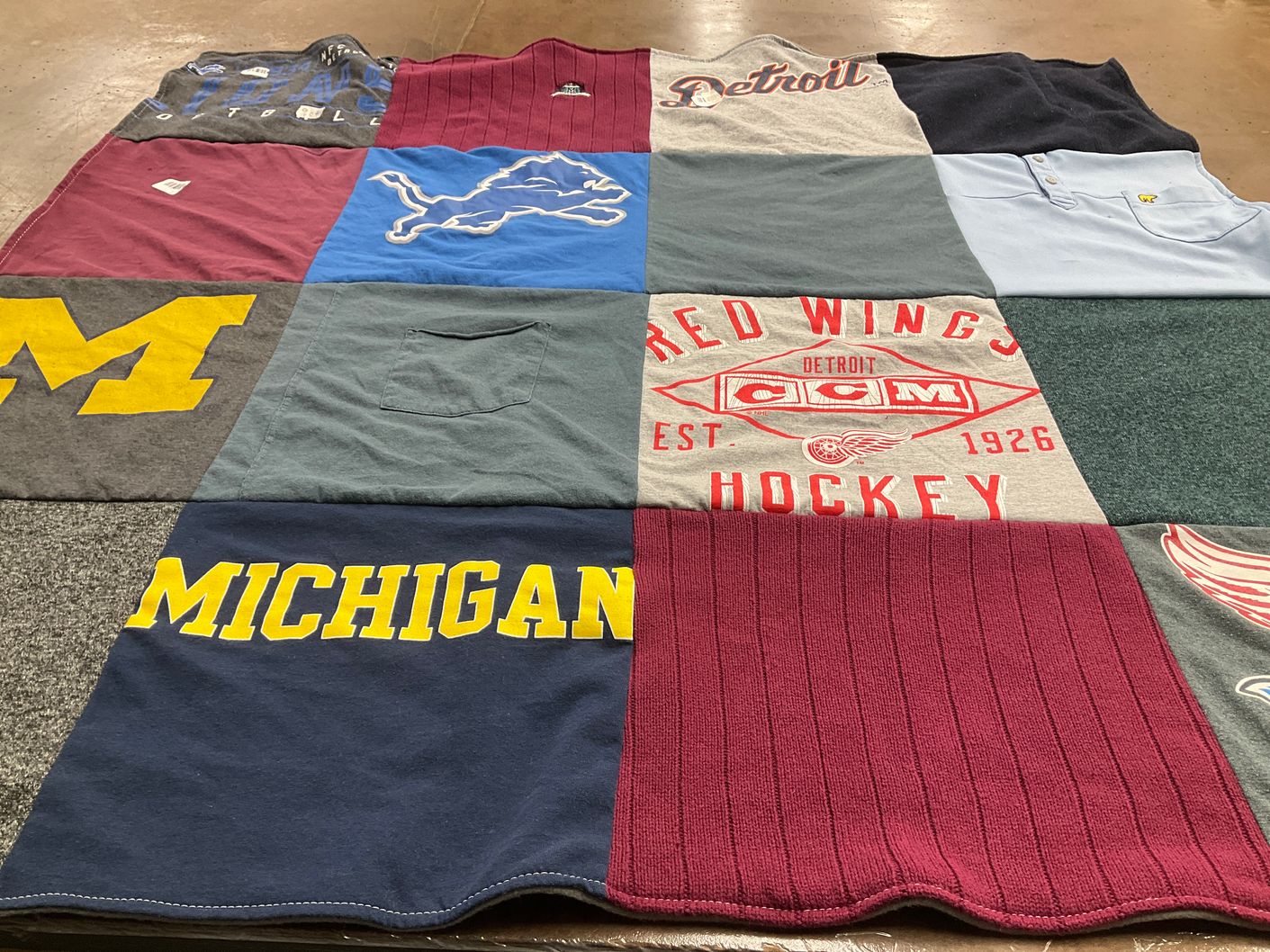 T-shirt quilt featuring detroit lions, detroit red wings by Amanda from MI