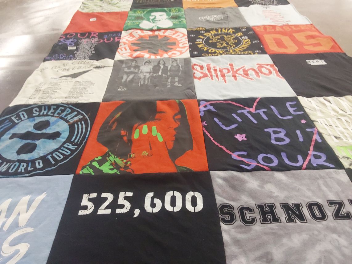 T-shirt quilt with music, concerts themes by Nancy from CA