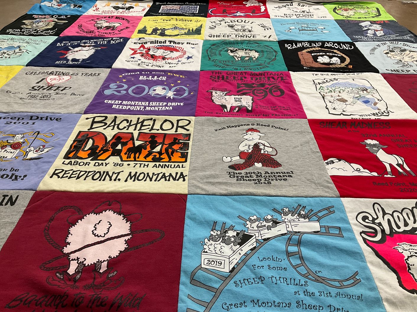 T-shirt quilt with sheep, farming themes by Julie from MT