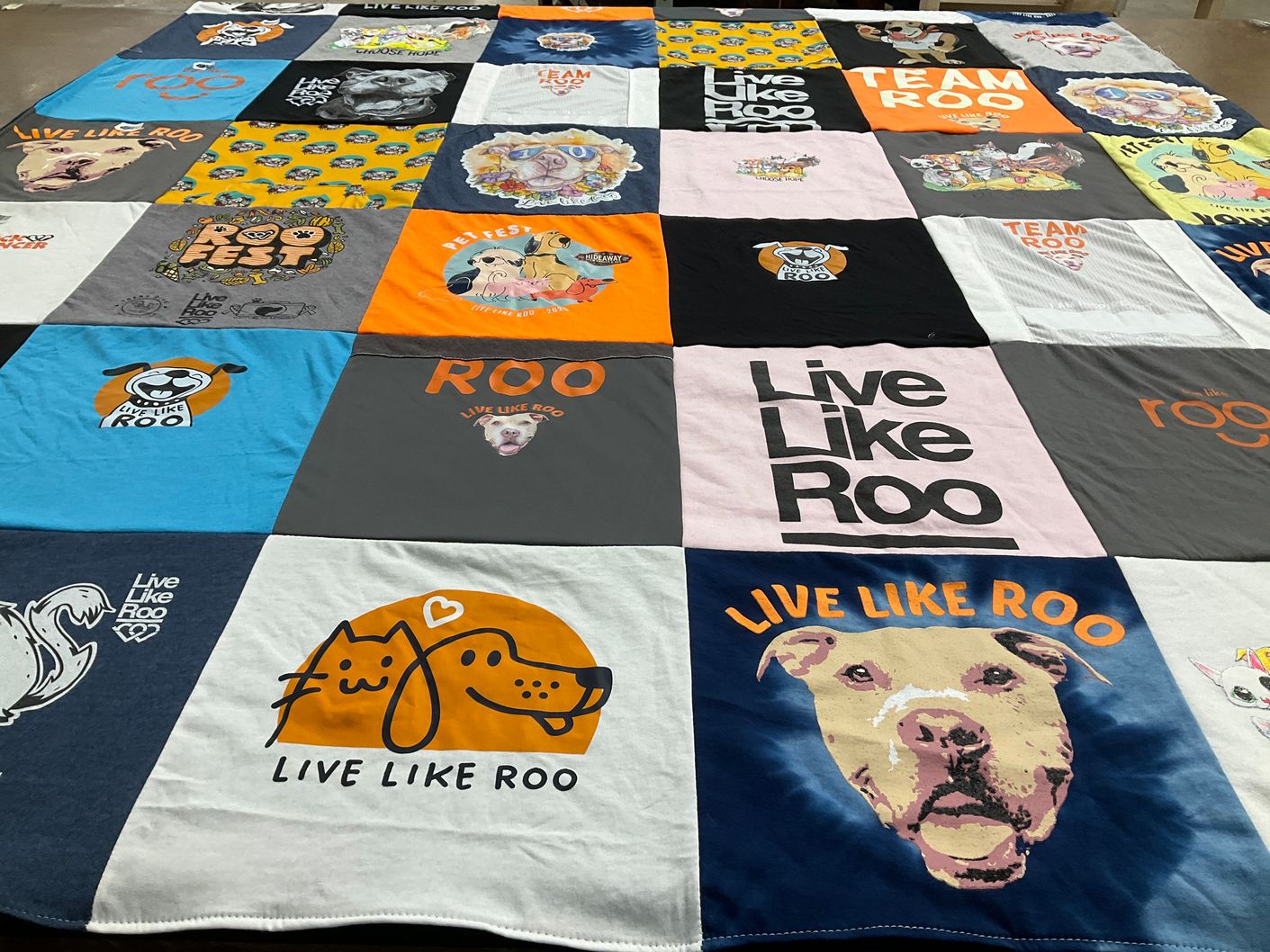 T-shirt quilt with pets, animal welfare themes by Sarah from IL