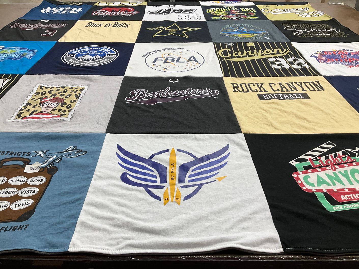 T-shirt quilt from rock canyon high school by Jennifer from CO