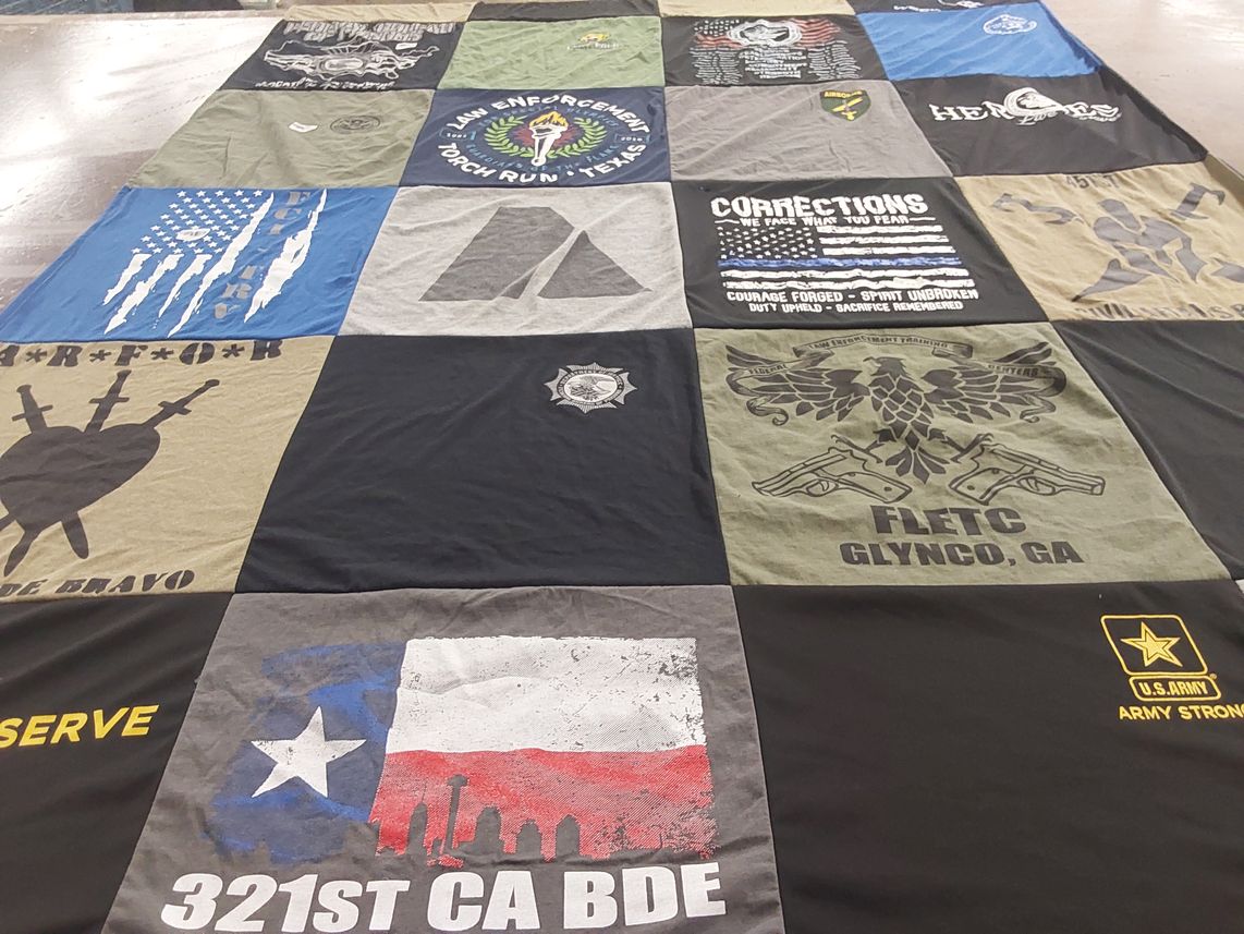 T-shirt quilt with law enforcement, military themes by Hector from TX