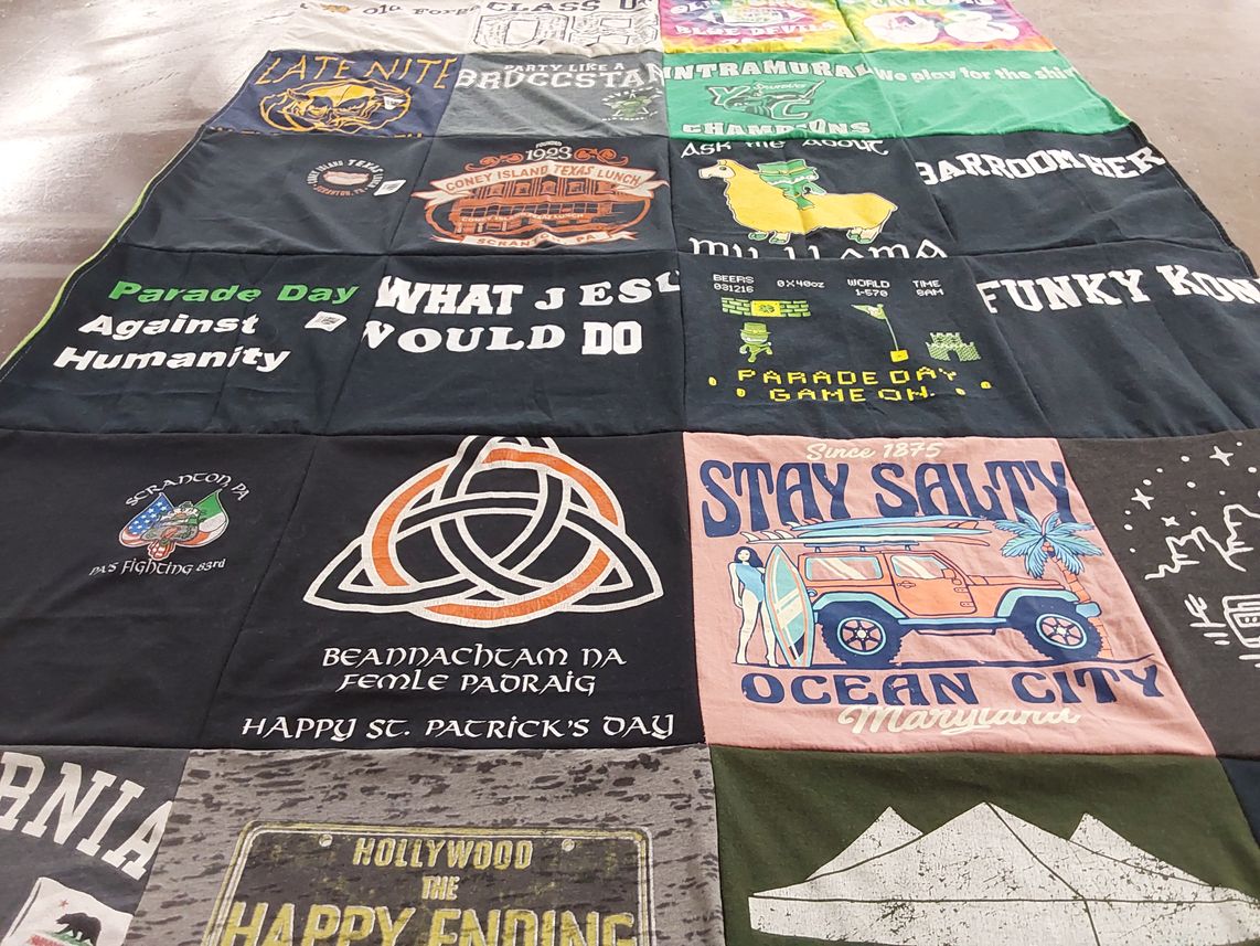 T-shirt quilt with community events, local culture themes by Maria from CA