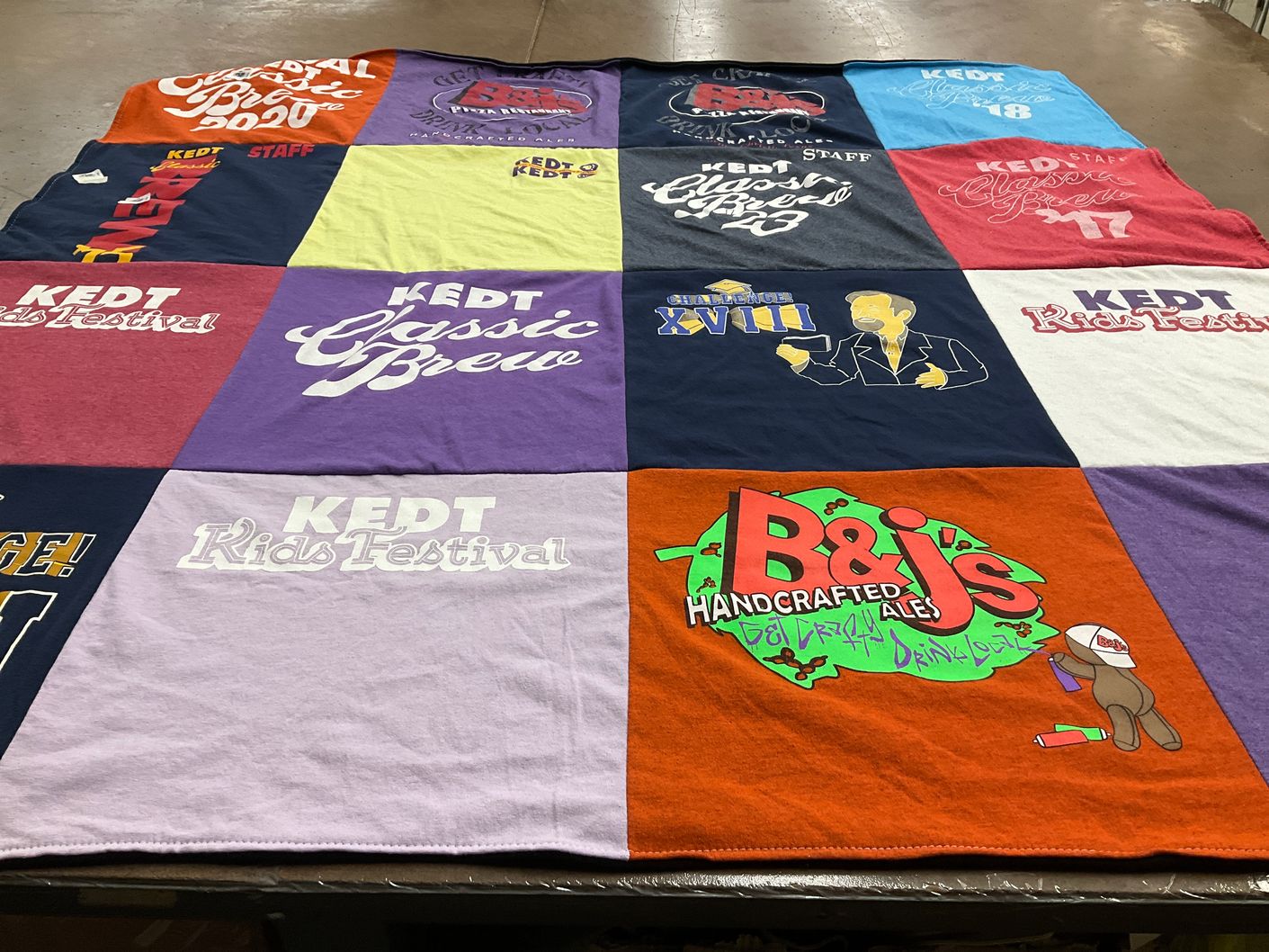 T-shirt quilt with festivals, events themes by Mari from TX