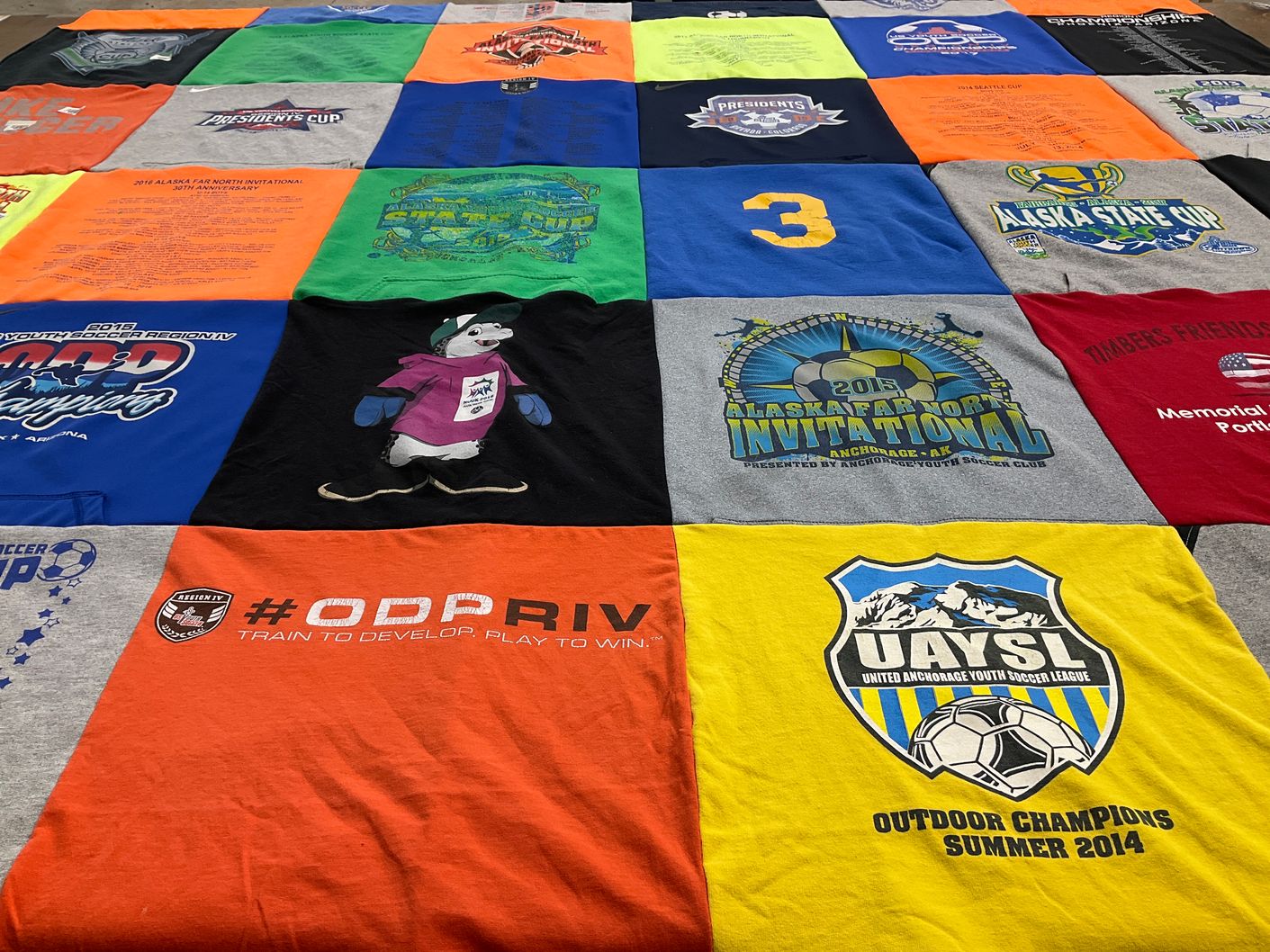 T-shirt quilt with soccer, youth sports themes by Amanda from AK