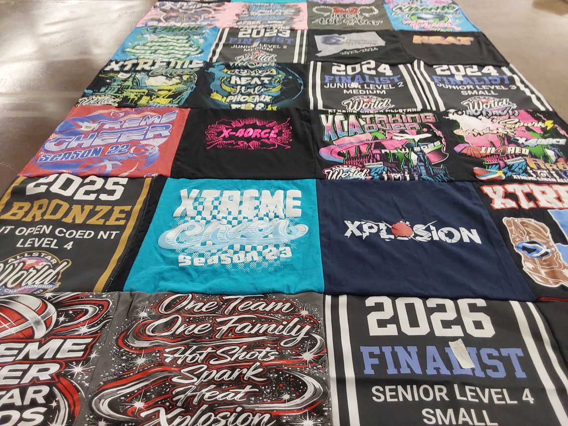 T-shirt quilt with cheerleading, competitions themes by Cathryn from NY