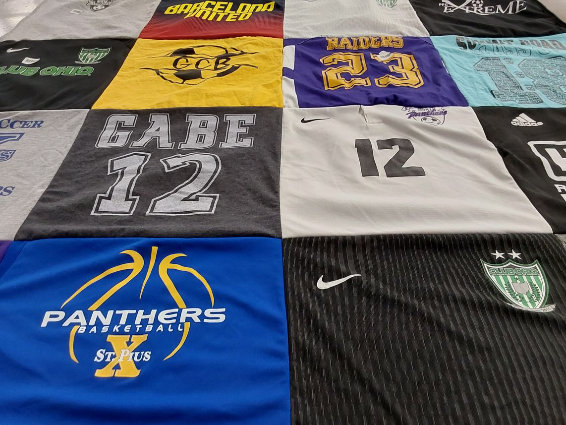 T-shirt quilt featuring panthers, raiders by Tara from OH