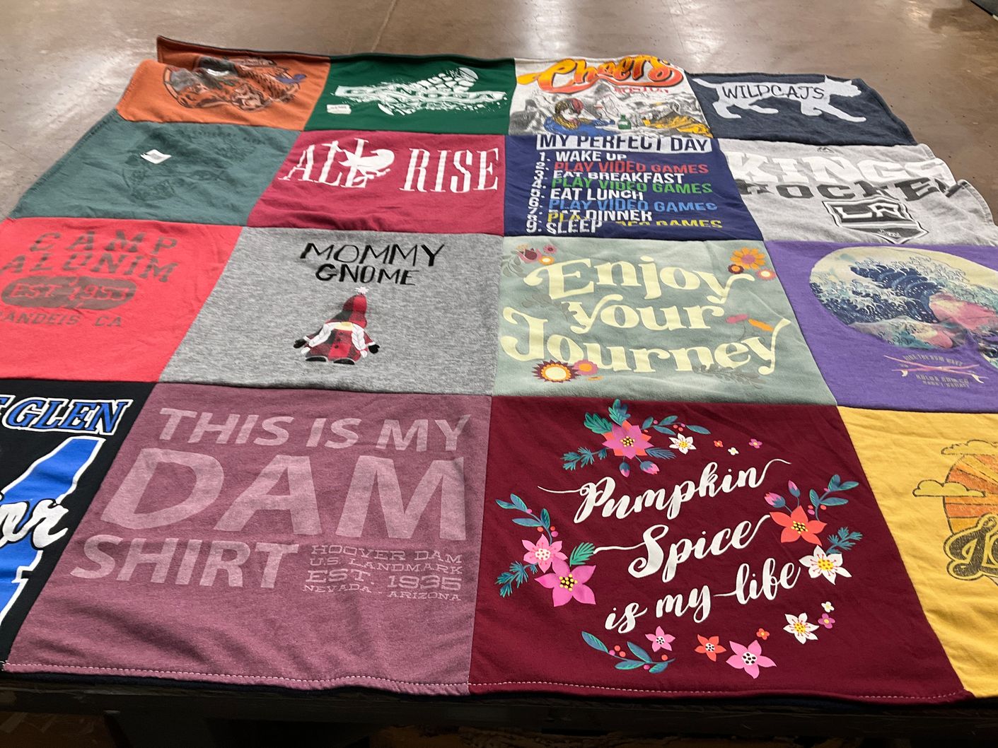 T-shirt quilt with video games, camping themes by Julie from CA