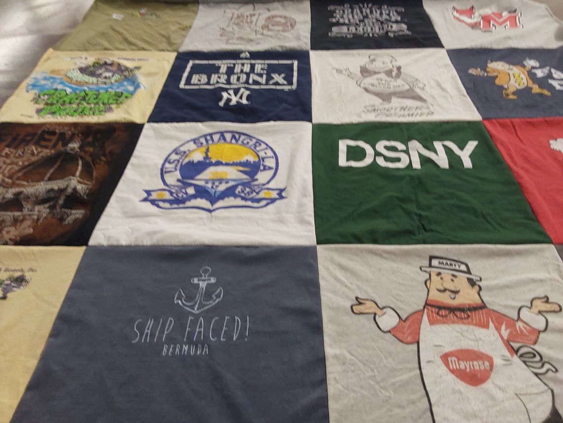 T-shirt quilt with travel, cooking themes by Elizabeth from NY