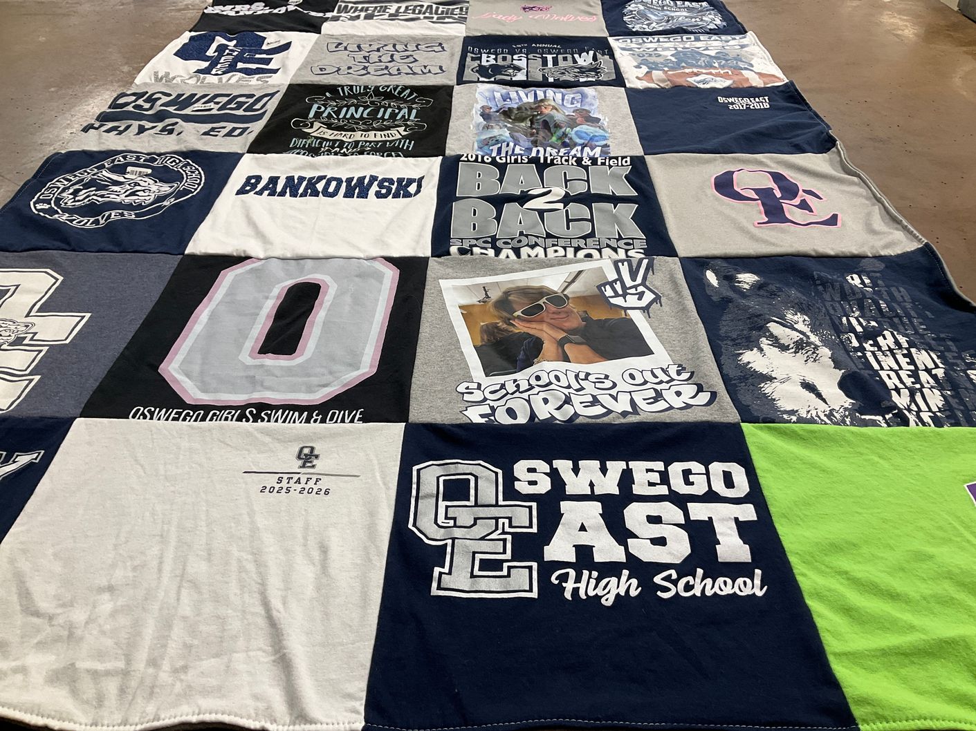 T-shirt quilt from oswego east high school by Laura from IL