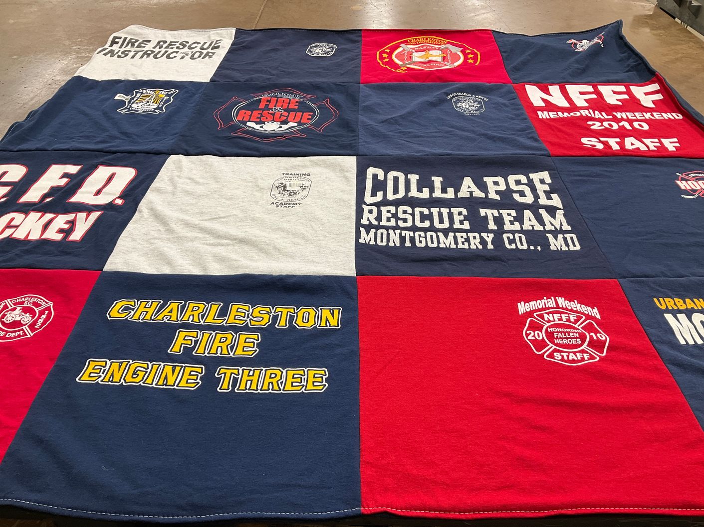 T-shirt quilt with firefighting, rescue operations themes by Amy from MD