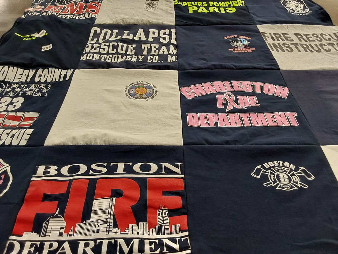 T-shirt quilt with firefighting, rescue operations themes by Amy from MD