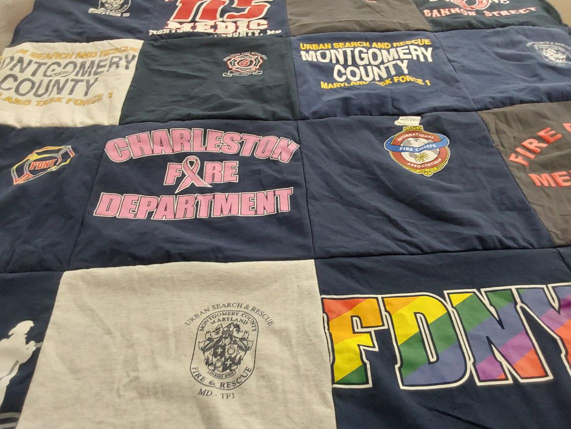 T-shirt quilt with firefighting, rescue services themes by Amy from MD