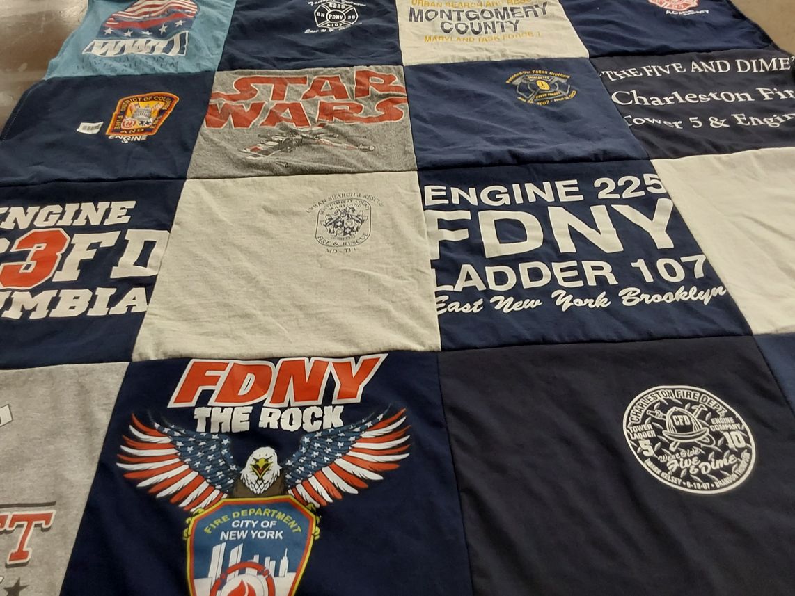 T-shirt quilt with firefighting, emergency services themes by Amy from MD
