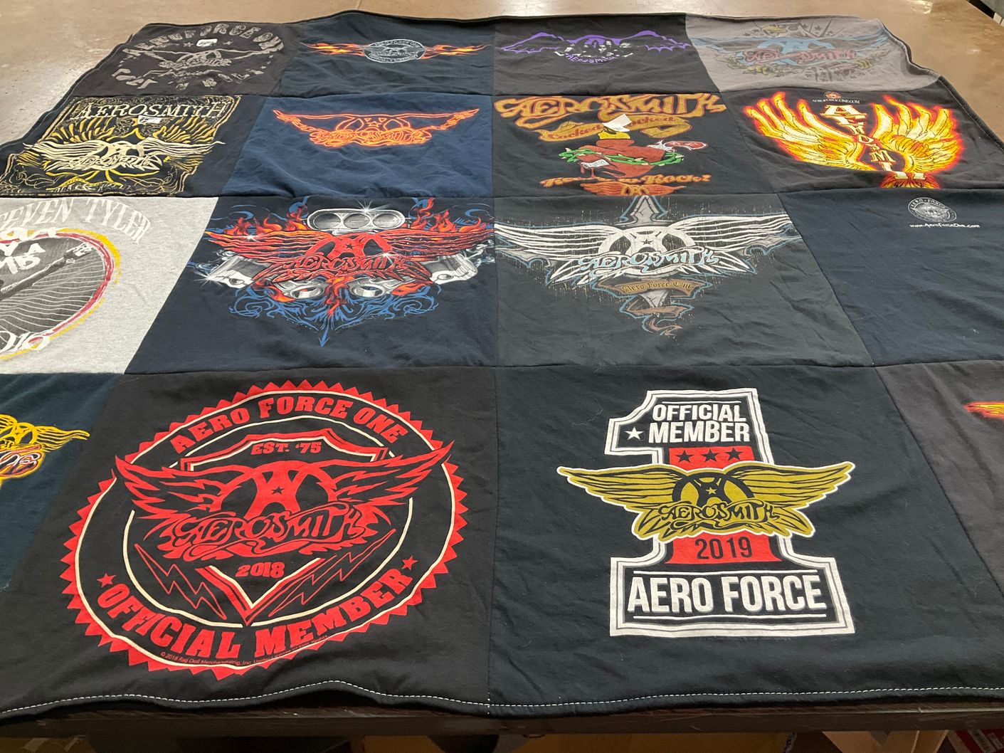 T-shirt quilt with music, rock themes by Daria from IL