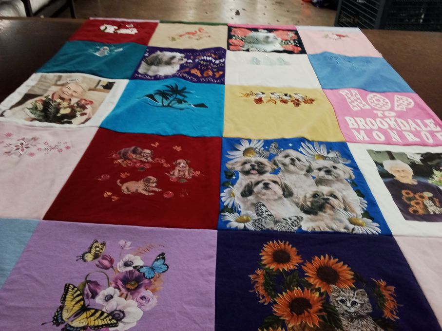 T-shirt quilt with animals, flowers themes by Shari from WA