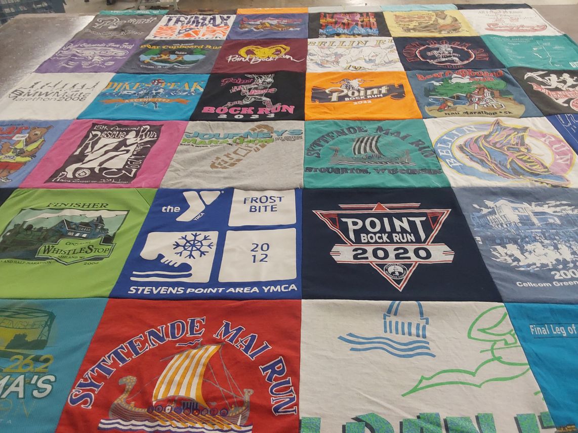 T-shirt quilt with running, fitness themes by David from WI