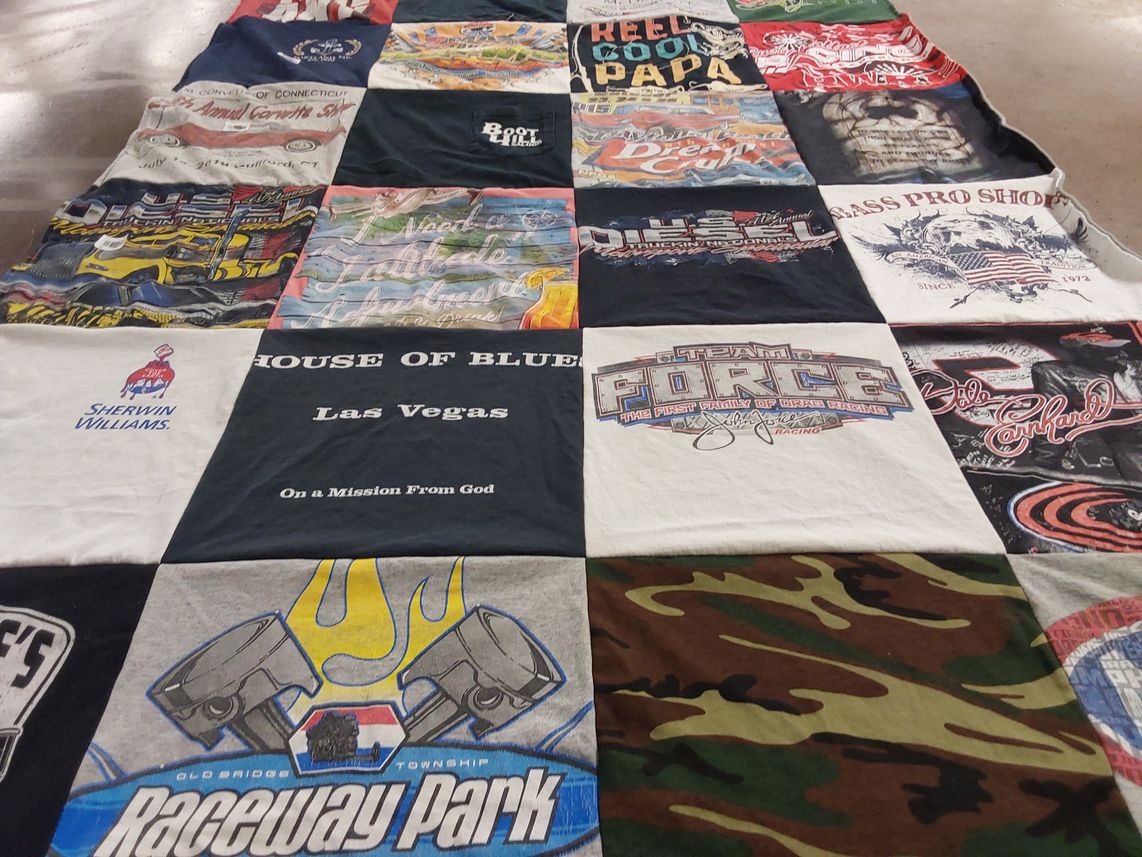 T-shirt quilt with music, racing themes by Darlene from FL