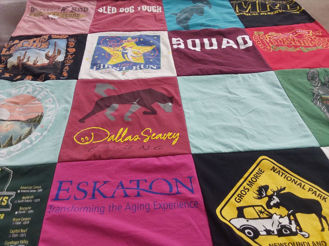 T-shirt quilt with outdoors, hiking themes by Audrey from CA