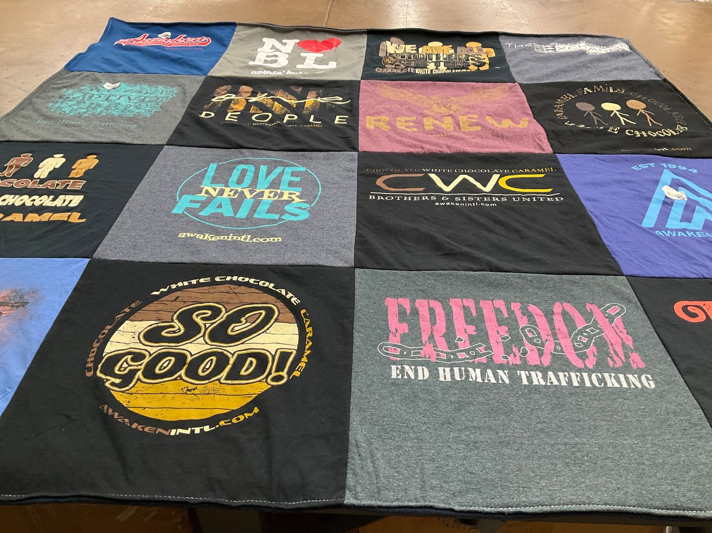 T-shirt quilt with human trafficking awareness, chocolate products themes by Taryn from GA