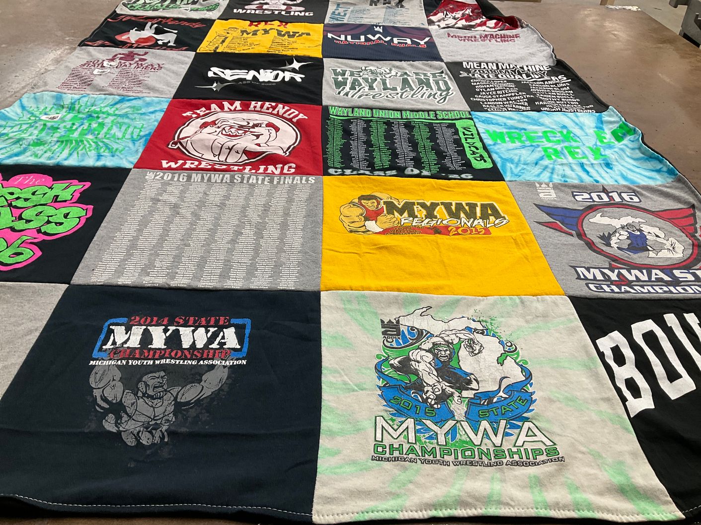 T-shirt quilt with wrestling, youth sports themes by Vestita from MI