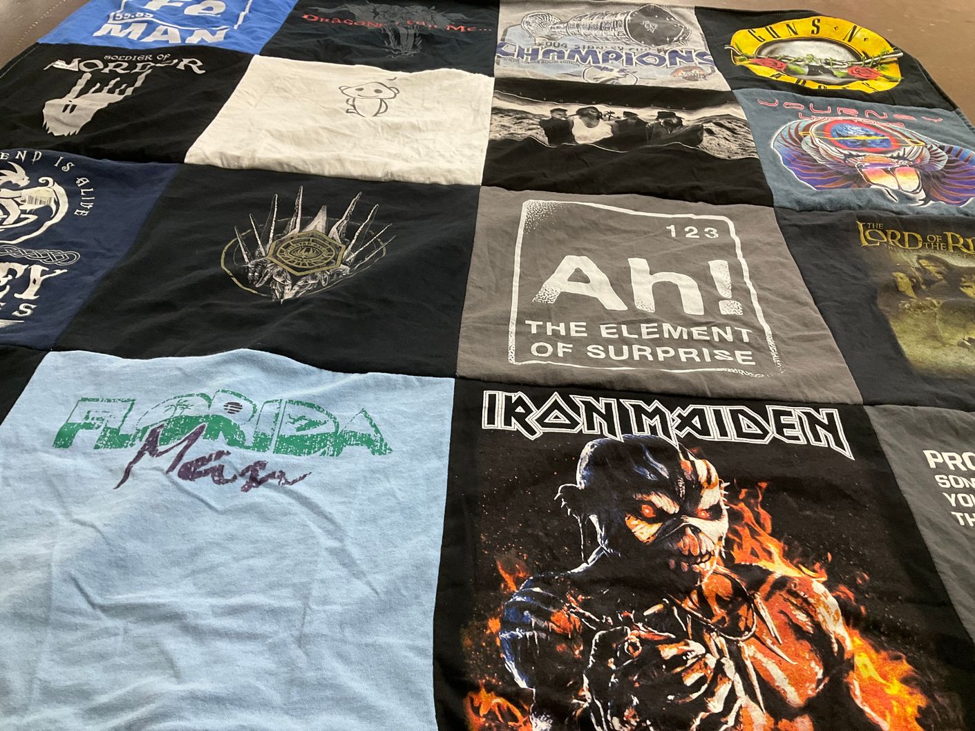 T-shirt quilt with music, movies themes by Beth from FL