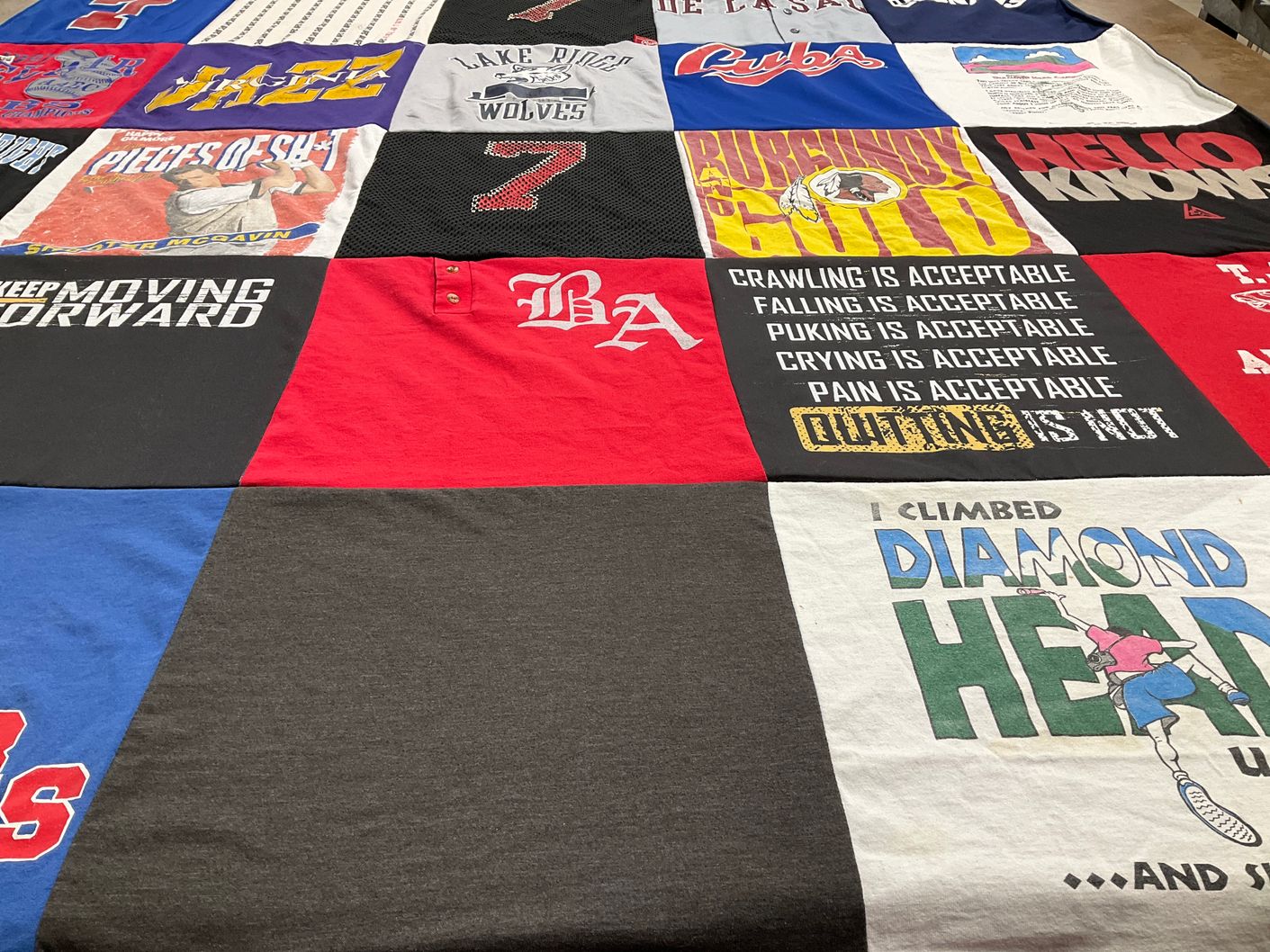 T-shirt quilt with sports, music themes by Jane from AL