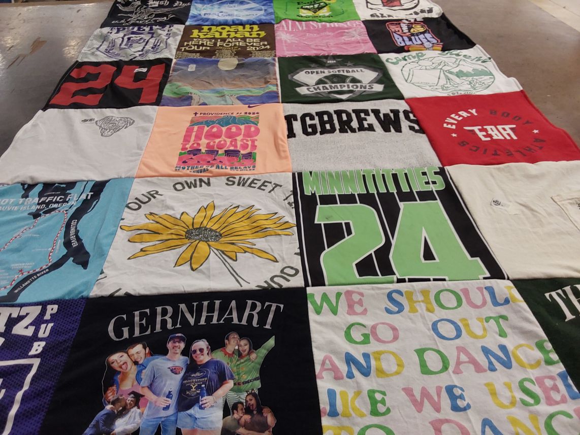 T-shirt quilt with softball, community themes by AnneMarie from OR