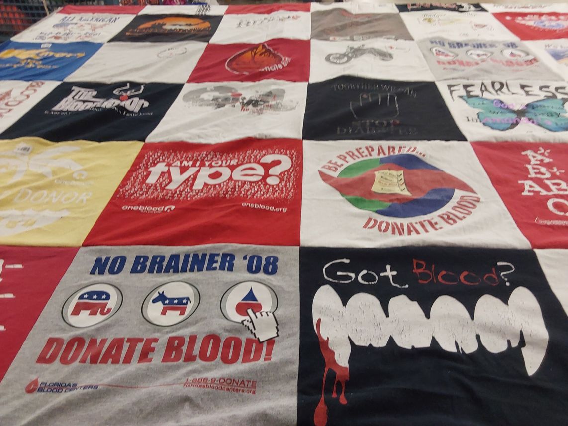T-shirt quilt with blood donation, health awareness themes by Bonnie from FL