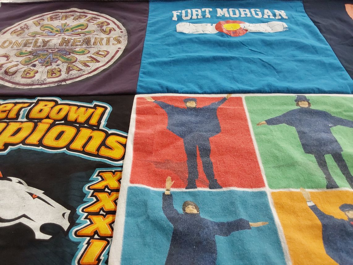 T-shirt quilt with music, sports themes by Sally from HI