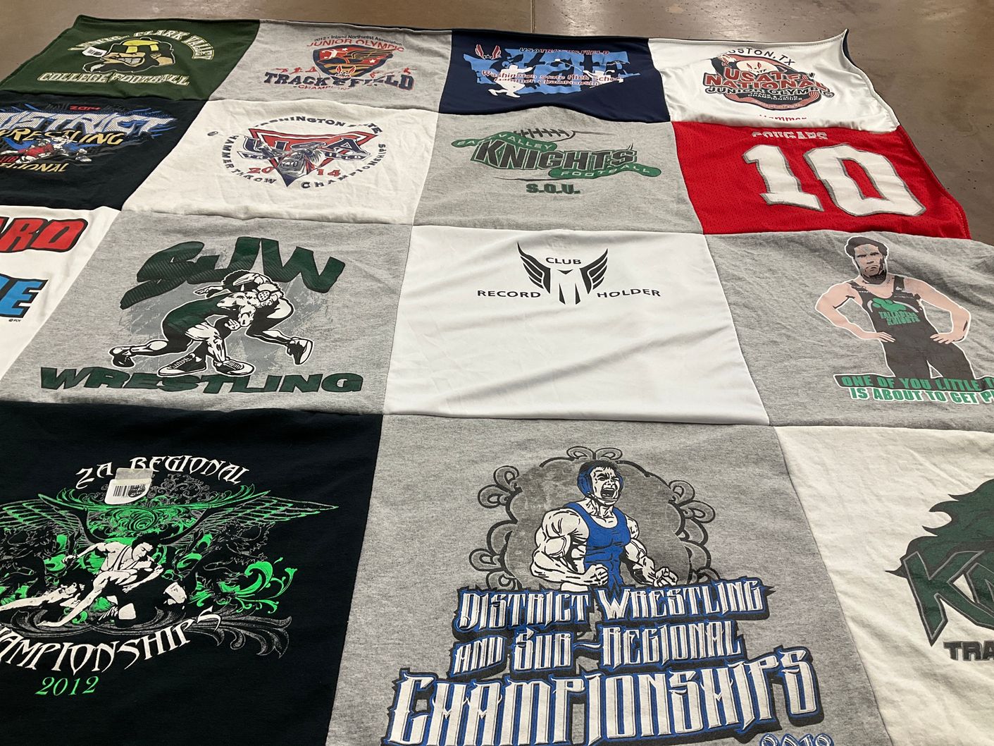 T-shirt quilt featuring sjw wrestling by Sandra from WA