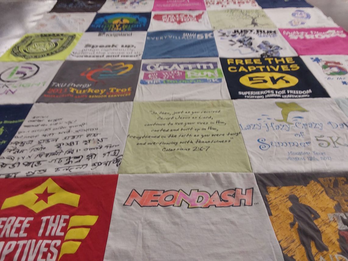 T-shirt quilt with running, human trafficking awareness themes by heidi from TX