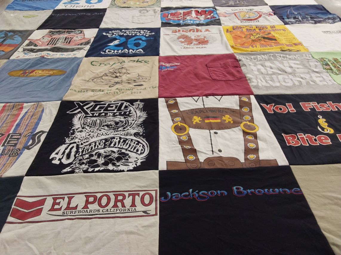T-shirt quilt with surfing, music themes by Gayle from CA