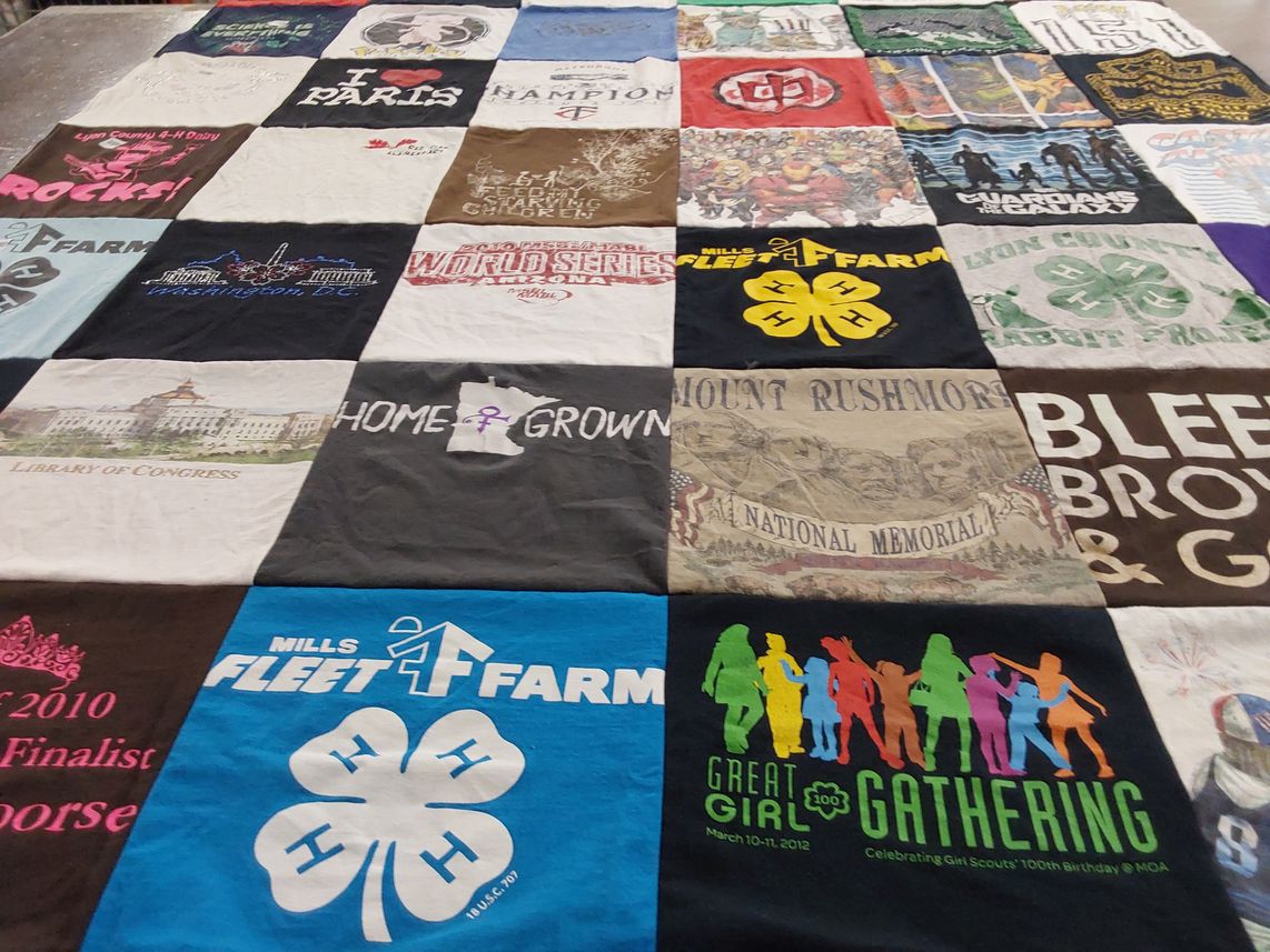T-shirt quilt with 4-h, girl scouts themes by Denise from MN