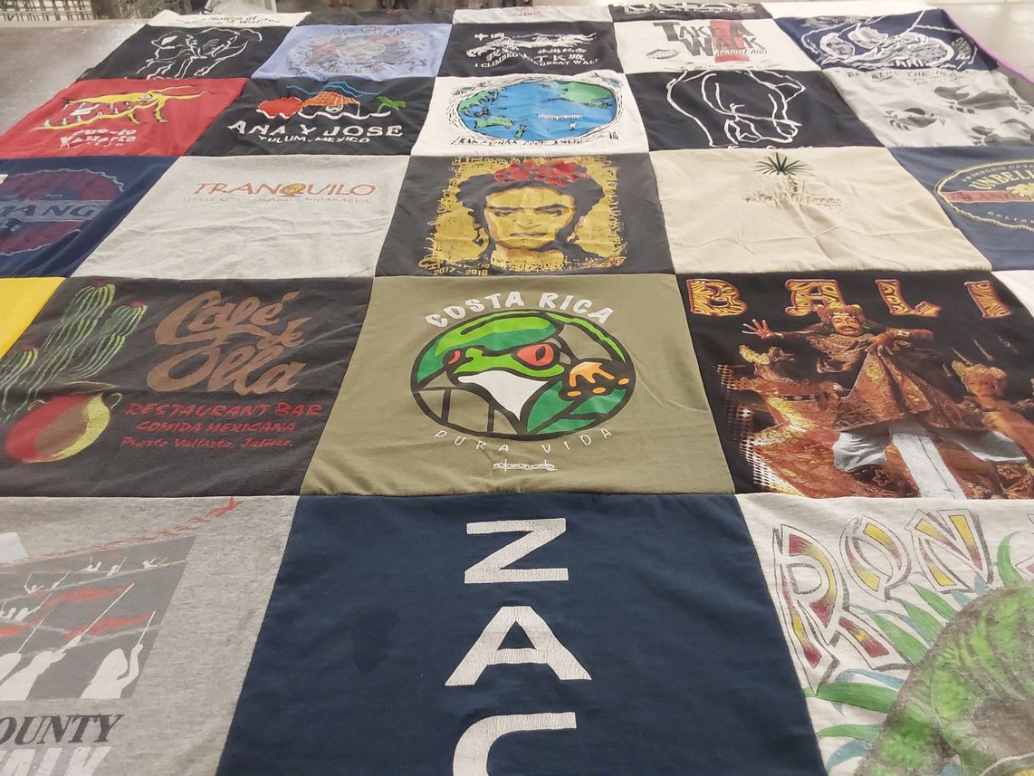 T-shirt quilt with travel, food themes by Les from WA