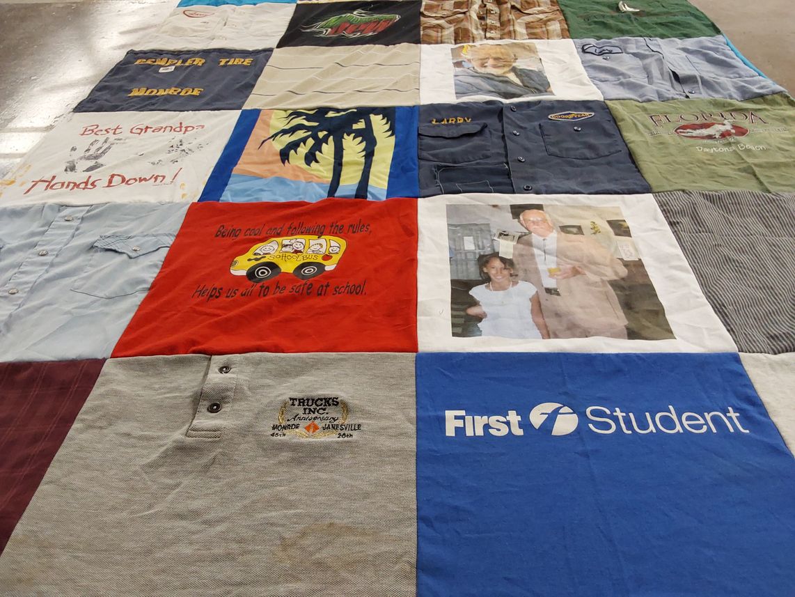 T-shirt quilt with family, safety themes by CARRIE from WI