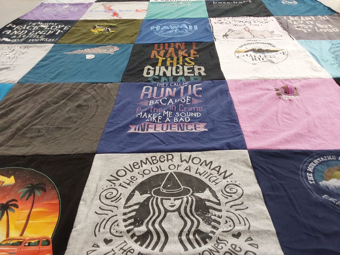 T-shirt quilt with travel, holiday themes by Michelle from FL