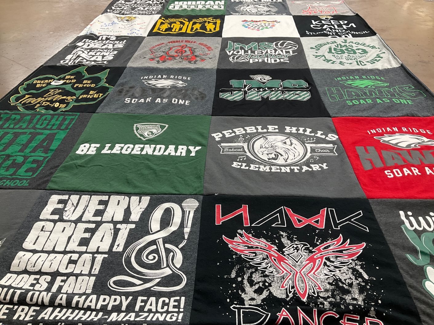 T-shirt quilt featuring indian ridge hawks, pebble hills bobcats by Darrin from TX