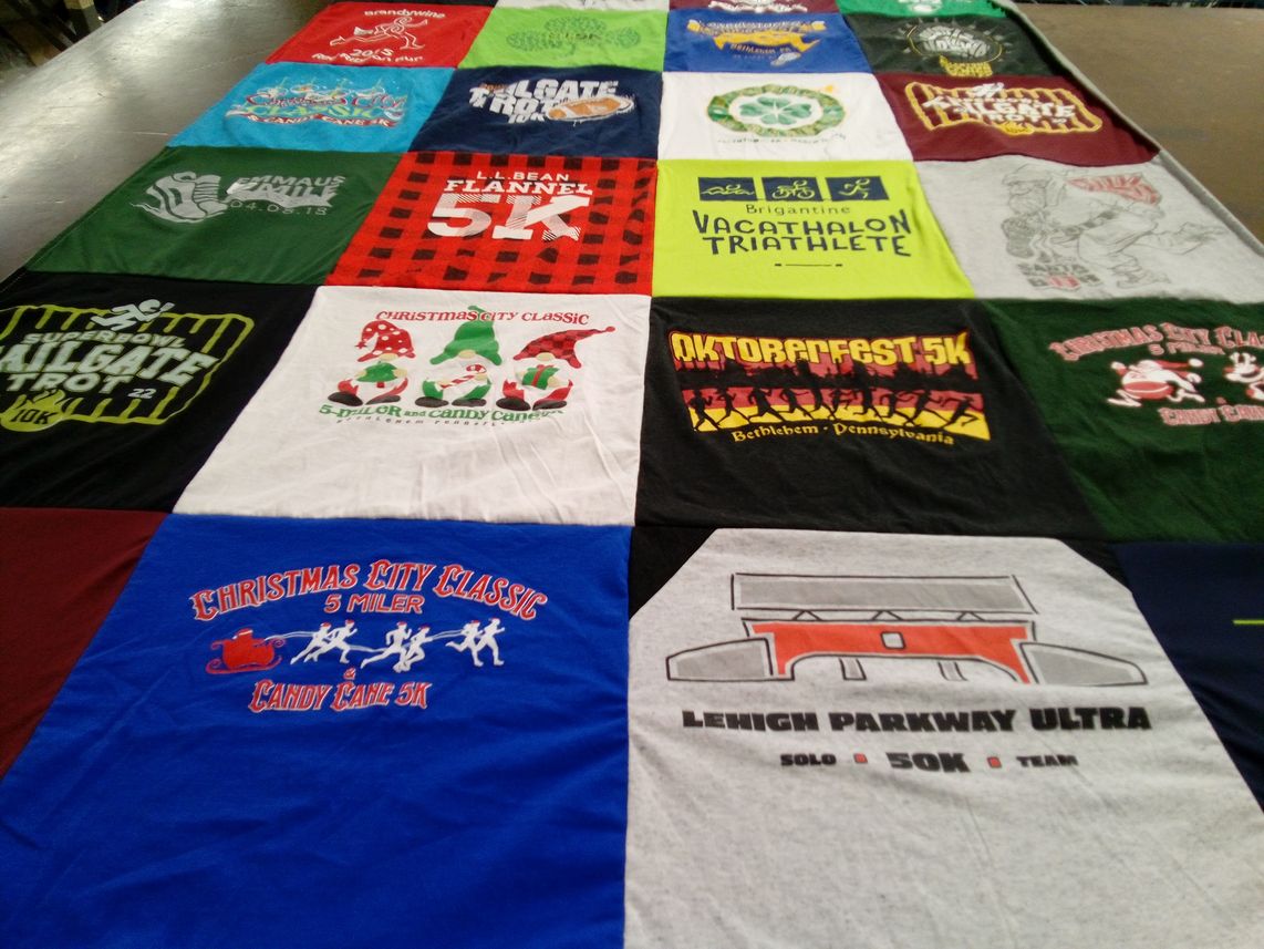 T-shirt quilt with running, winter events themes by Shirley from PA
