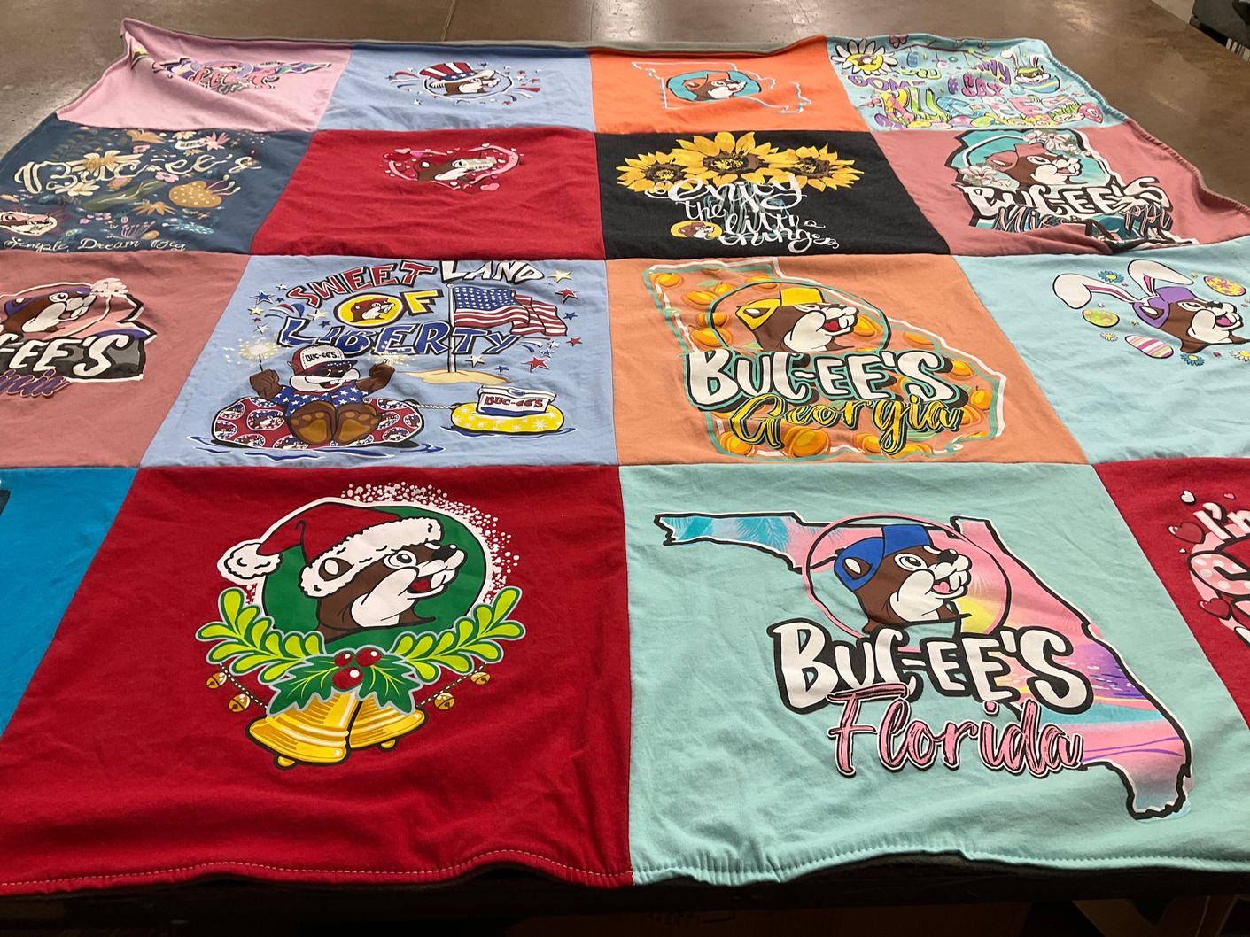 T-shirt quilt with travel, road trips themes by Kristin from MI