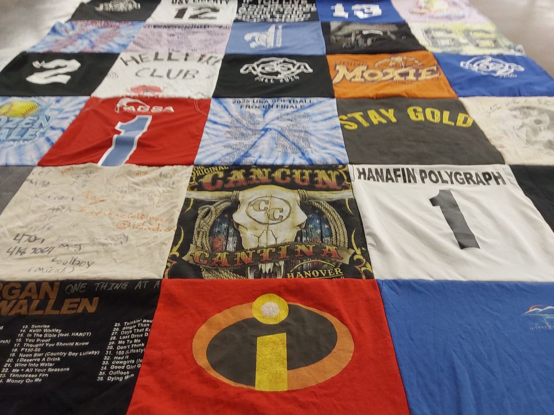 T-shirt quilt with music, travel themes by Alicia from VA