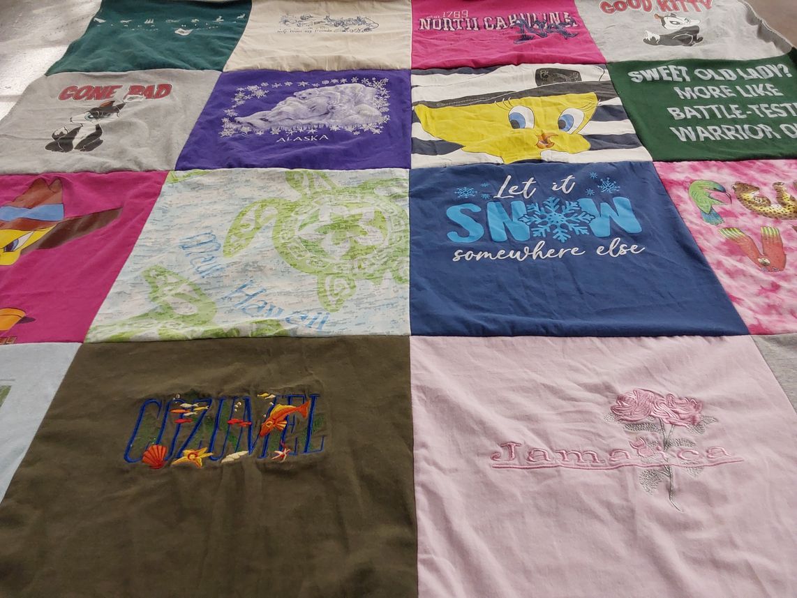 T-shirt quilt with travel, animals themes by Stephanie from MN