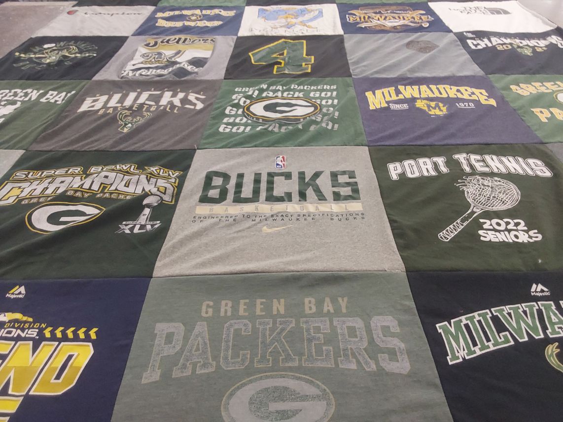 T-shirt quilt featuring green bay packers, milwaukee bucks by Sheri from WI