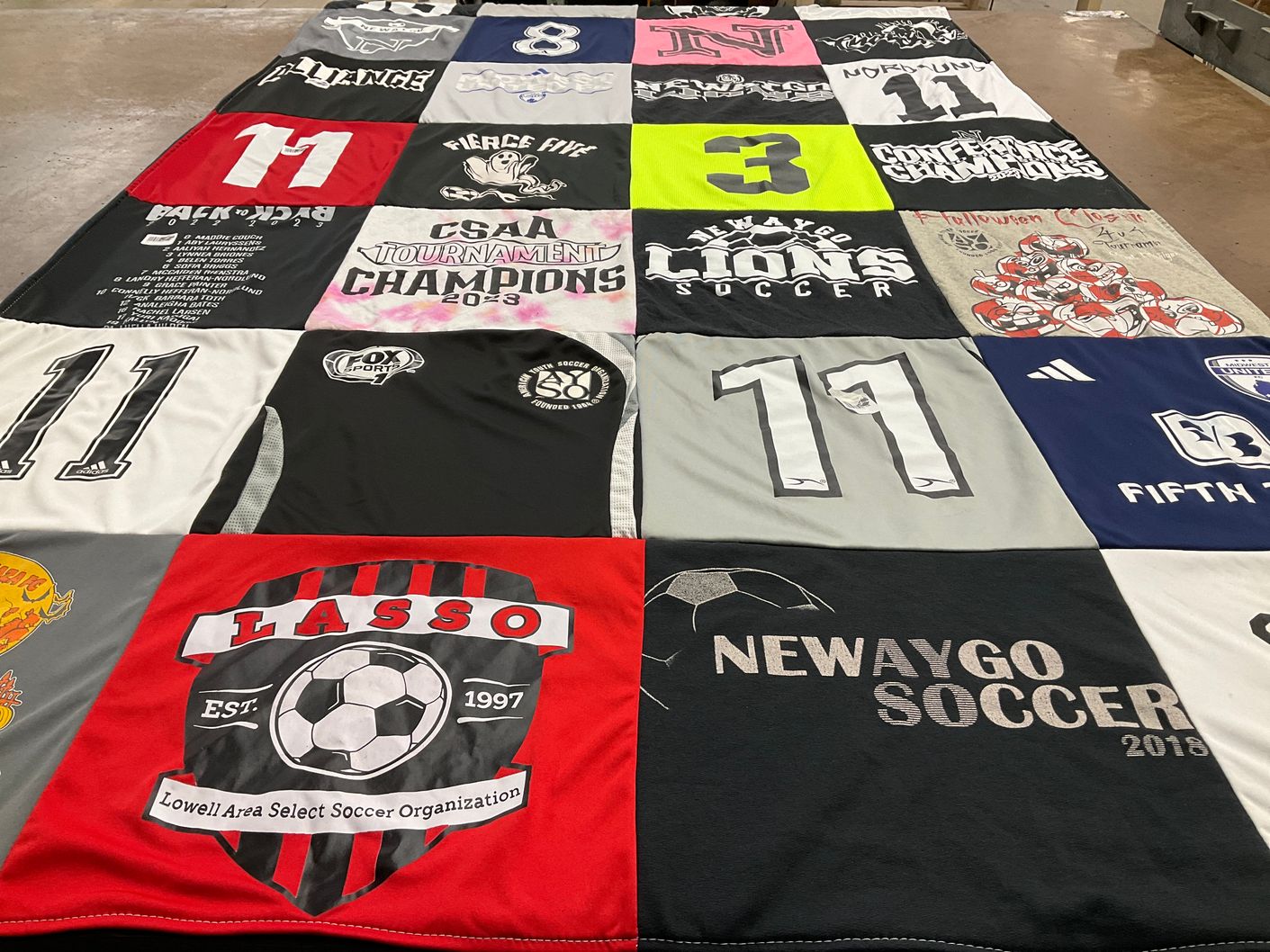 T-shirt quilt featuring newaygo lions soccer by Erik from MI