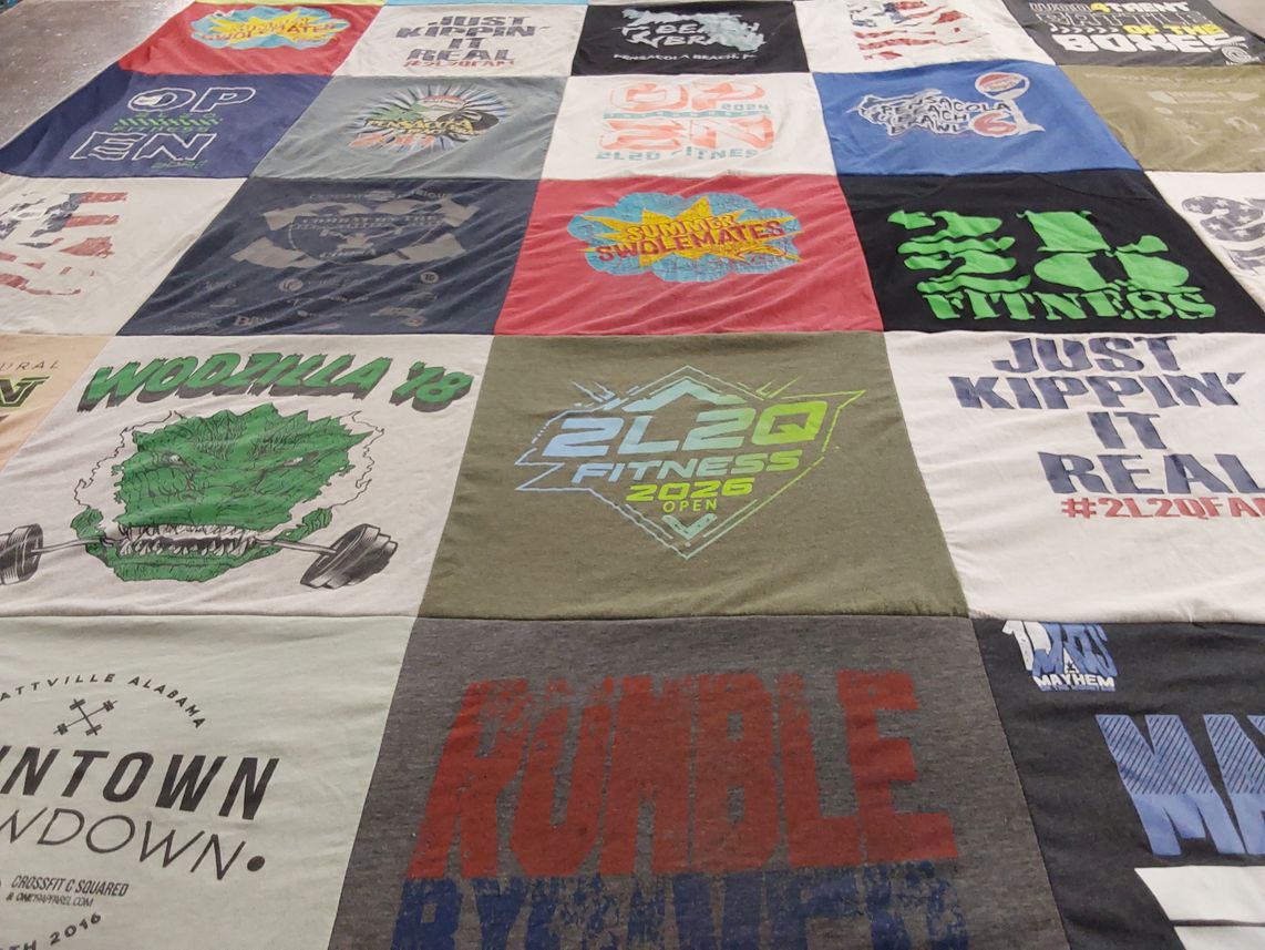 T-shirt quilt with fitness, exercise themes by Chase from AL