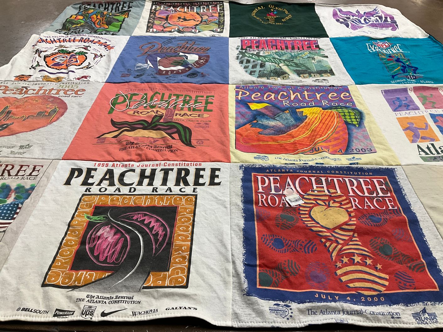 T-shirt quilt with running, sports themes by Joe from GA
