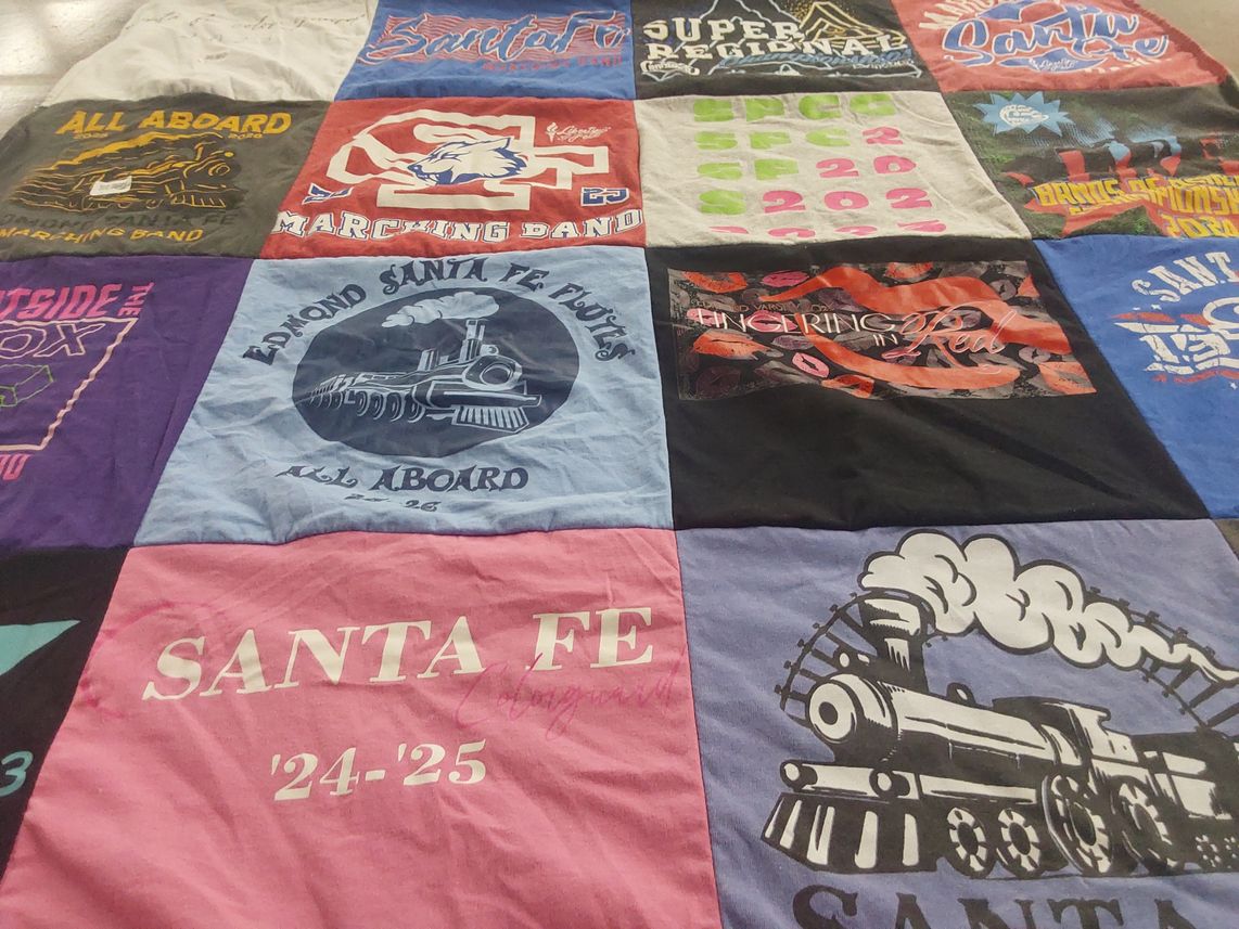 T-shirt quilt from edmond santa fe high school by Reid from OK